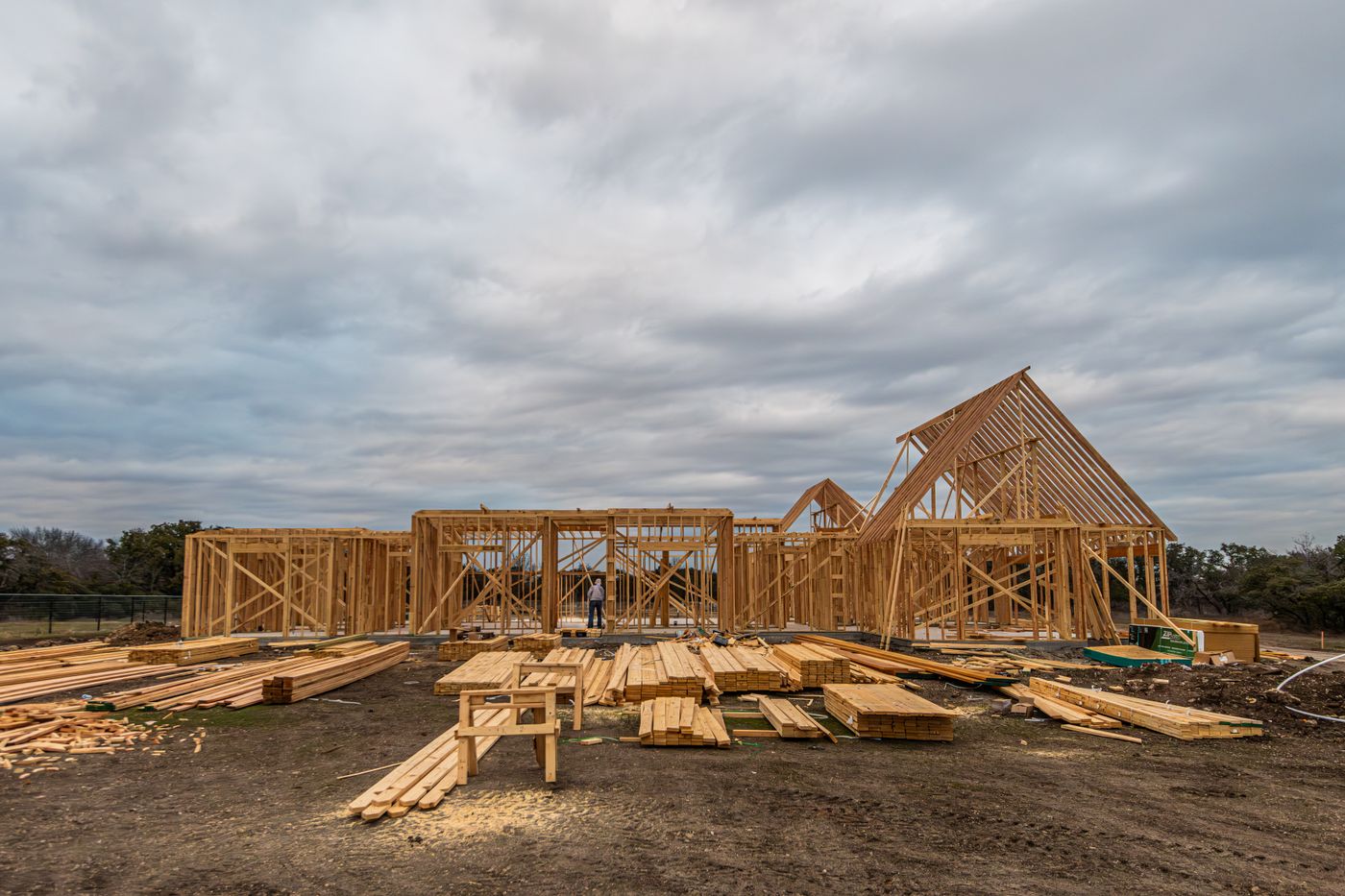 Steel framing rising at a commercial construction site